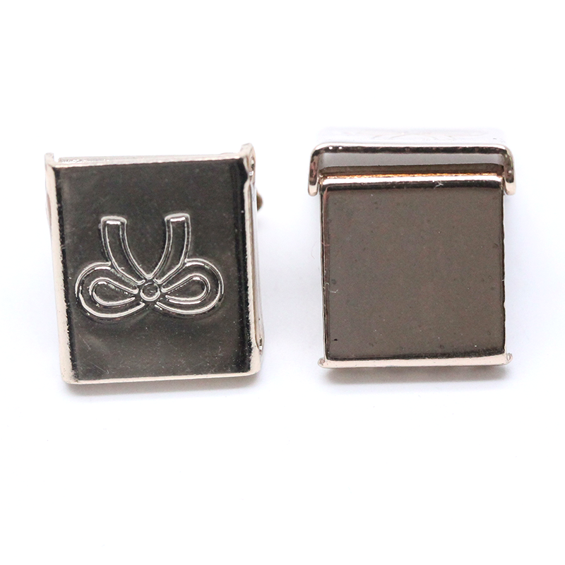 WG3590 13.5*11mm铜蝴蝶结方形齿状尾夹