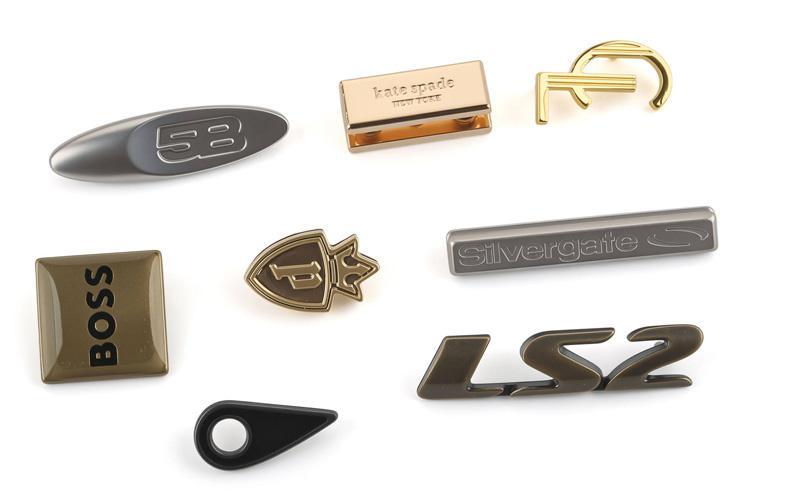 AB亚洲钮扣 (ASIABUTTON) 引领行业风潮：专注高品质合金标牌与标签，打造品牌身份新高度