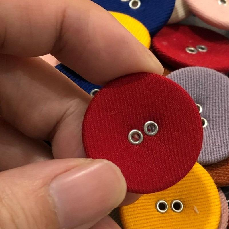 AB亚洲钮扣：布包钮扣——复古美学与功能性的双重回归